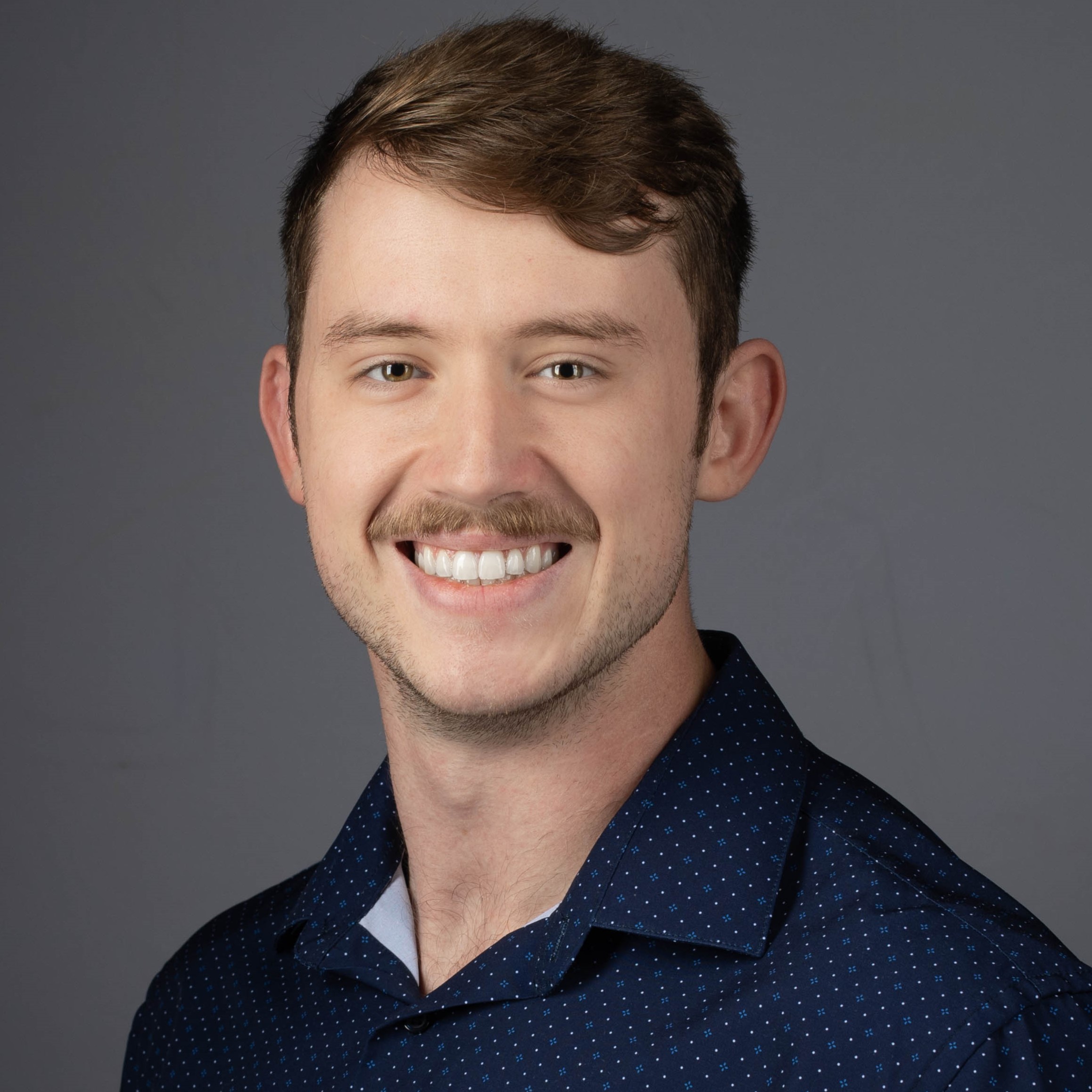 Headshot of Tanner Mergist, Co-Founder & Chief Technology Officer